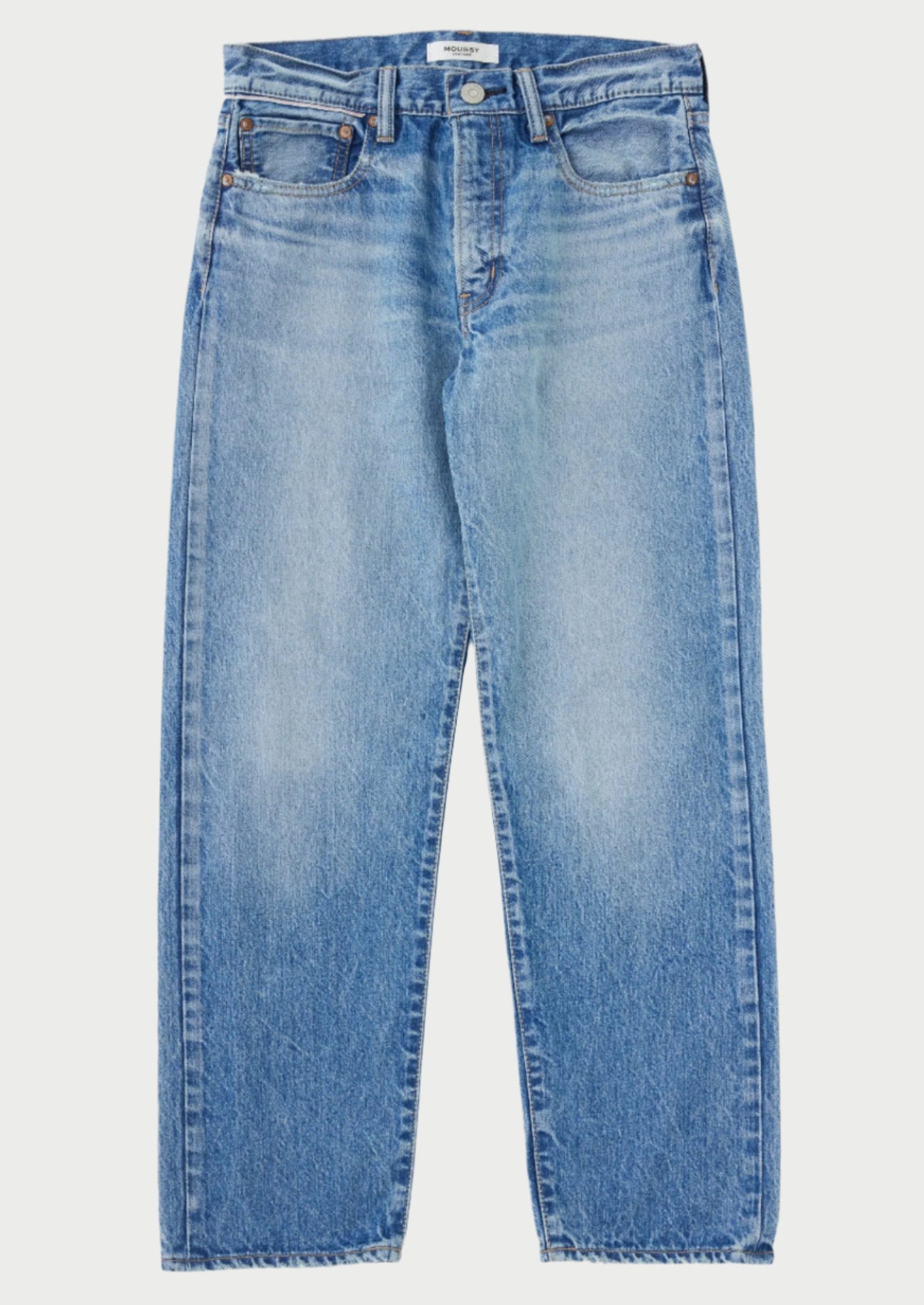 The MAPLECREST BOYS JEANS by Moussy are showcased on a plain background. These light blue, high-rise denim jeans feature a classic five-pocket design, belt loops, and a button fly. The fabric displays slight fading and a comfortably worn look, particularly around the knee and thigh areas.