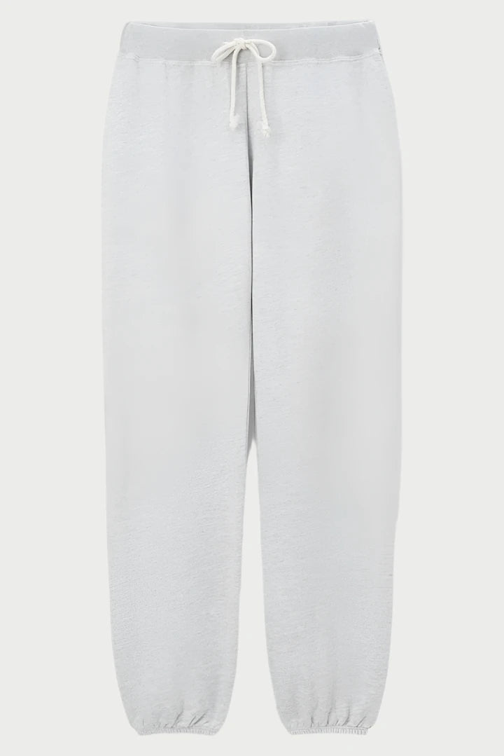 A pair of Toni Jogger by perfectwhitetee with an elastic waistband and white drawstring. The ankle cuffs are also elasticated, offering a relaxed and comfortable fit. The fabric appears soft and cozy, matching perfectly with our loungewear sets or hoodies for casual wear or lounging.