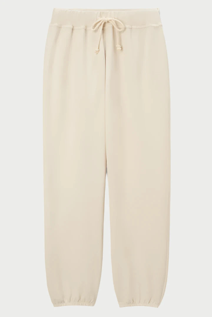 A pair of perfectwhitetee Toni Jogger pants with an elastic waistband and drawstring, perfect as part of cozy loungewear sets. The pants feature elastic cuffs at the ankles and a relaxed fit. The fabric appears soft and comfortable, suitable for casual wear or lounging.