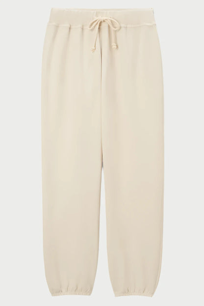 A pair of perfectwhitetee Toni Jogger pants with an elastic waistband and drawstring, perfect as part of cozy loungewear sets. The pants feature elastic cuffs at the ankles and a relaxed fit. The fabric appears soft and comfortable, suitable for casual wear or lounging.