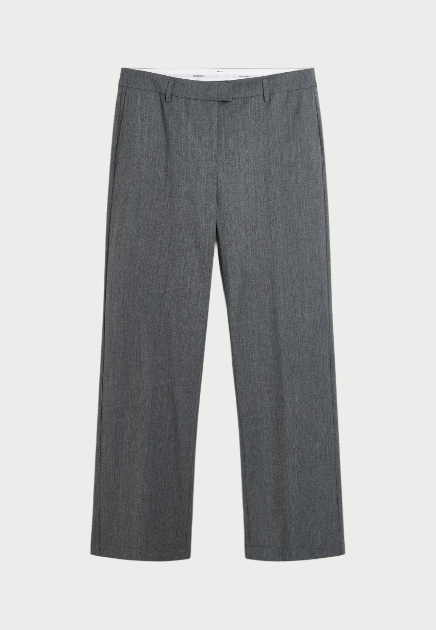 A pair of Herskind's Jack Pants, in gray with a straight-leg cut, is displayed against a white background. These men's-inspired pants feature a flat front with belt loops, a front zip closure, and subtle creasing. The texture appears smooth, and the fabric has a slightly heathered appearance, perfect for achieving that tailored look.