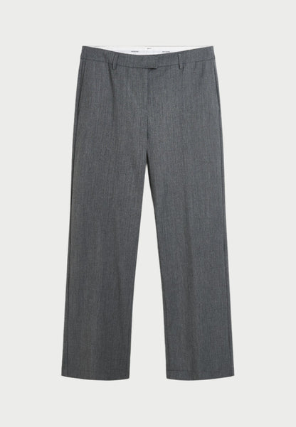 A pair of Herskind's Jack Pants, in gray with a straight-leg cut, is displayed against a white background. These men's-inspired pants feature a flat front with belt loops, a front zip closure, and subtle creasing. The texture appears smooth, and the fabric has a slightly heathered appearance, perfect for achieving that tailored look.