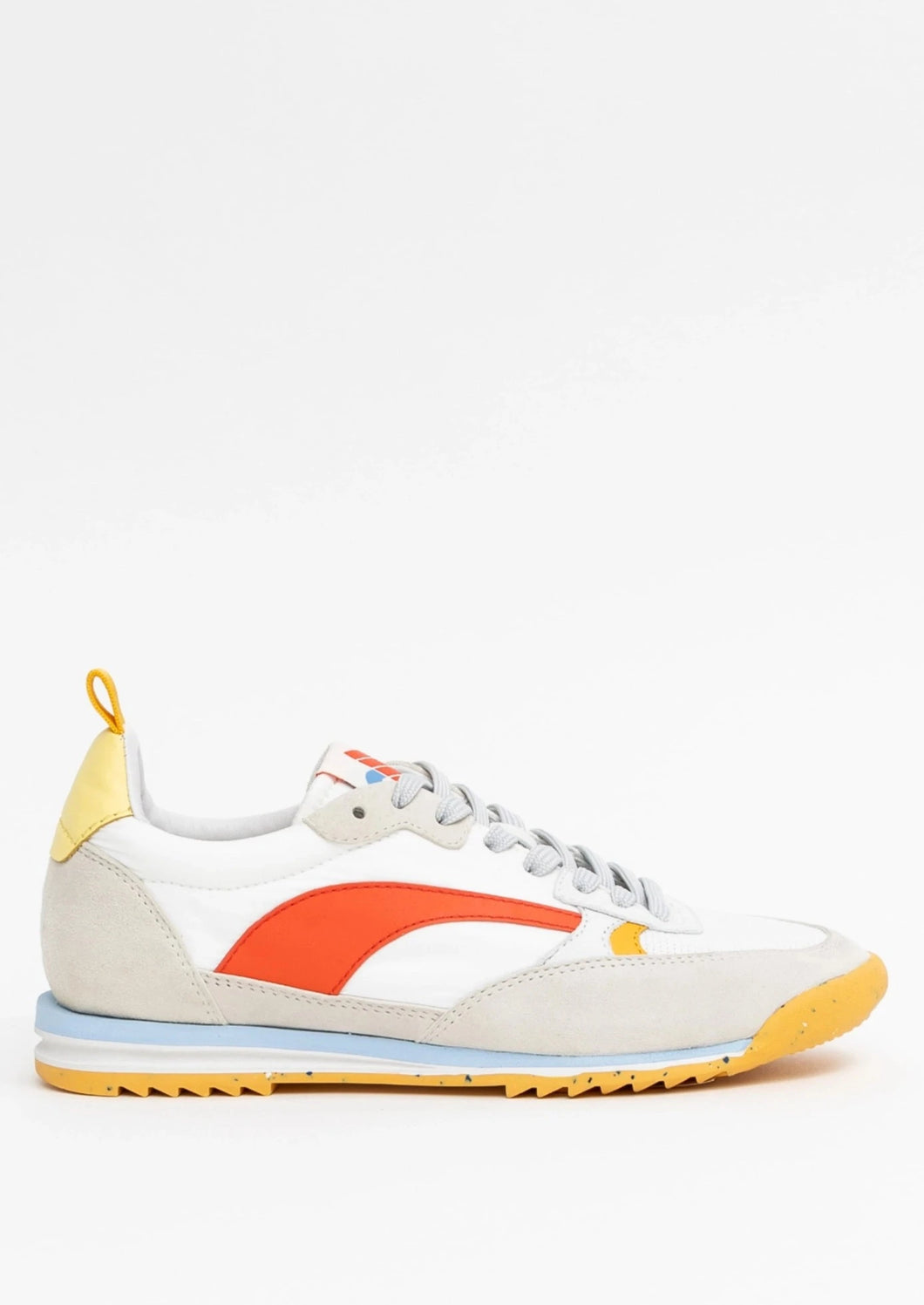 The Oncept Montreal Shoe showcases effortless style with a white and gray base, featuring an orange stripe on the side. It has a yellow accent on the heel and toe, a blue sole, and gray laces. This sleek design is modern and sporty, perfect for casual wear.