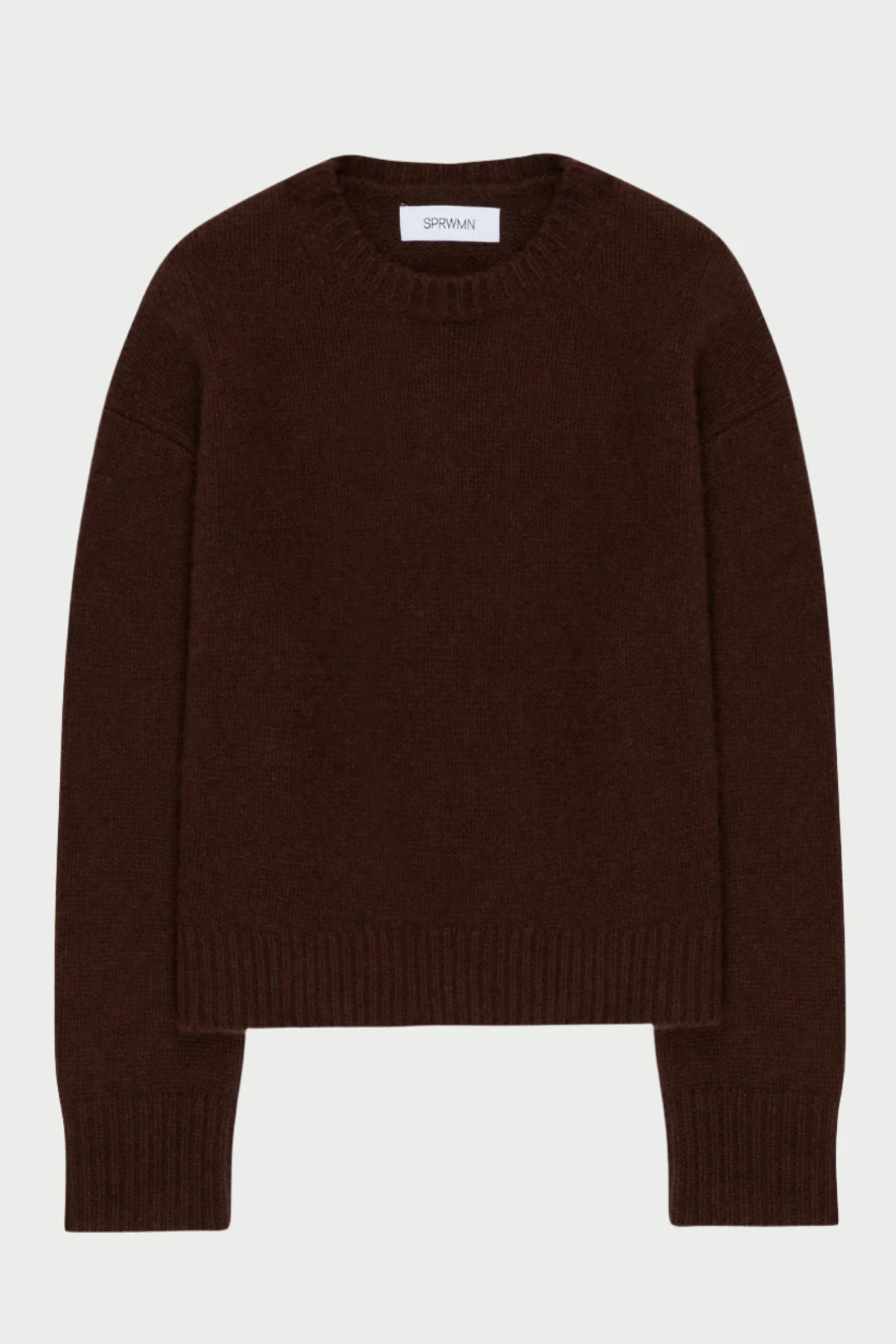 A Brown Heavy Crewneck Sweater by SPRWMN, made from luxurious cashmere with long sleeves and a crew neckline, is shown laid flat against a light backdrop. The label inside the collar is visible, making it an ideal choice for cozy fall days.