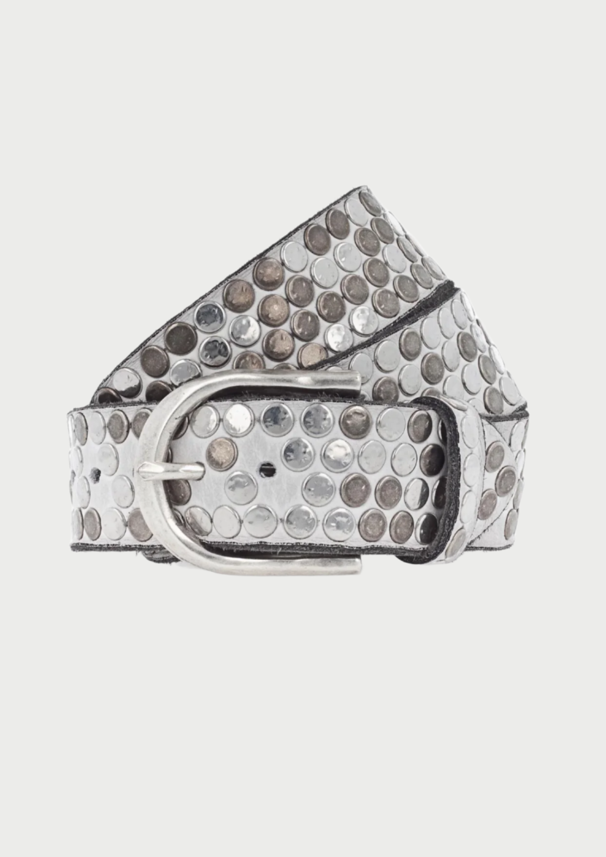 A stylish B.Belt Studded Hammered Belt with circular metallic studs and a matching silver buckle, coiled in a compact form. The belt features a modern design with round, reflective studs covering its entire length, giving it an edgy look and superior quality.