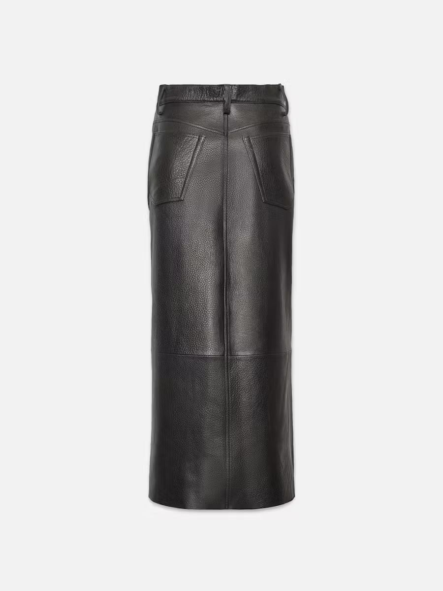 The Long Leather Skirt by Frame is crafted from luxurious black lamb leather and features a high waist with patch pockets on the front. Its sleek, straight design is enhanced by a central seam, creating a structured and modern look that subtly echoes an A-line silhouette.