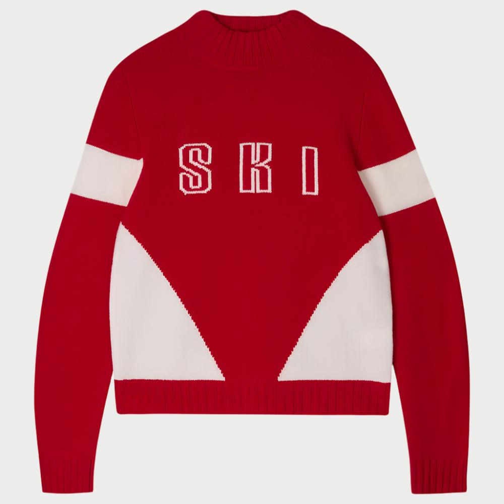 The Contrast Ski Sweater by JUMPER is a cozy red cashmere piece, highlighted by the word "SKI" in bold white across the chest. It features stylish white geometric designs on the sides and sleeves, making it perfect for ski lovers.