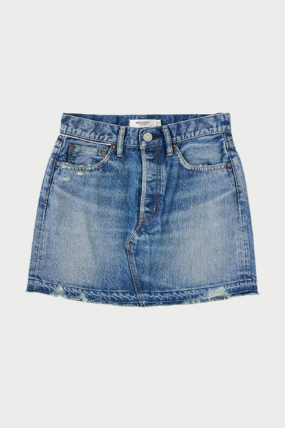 A blue **Mini Denim Skirt** with frayed hem edges, perfect for a casual lunch outfit. The skirt features classic five-pocket styling, belt loops, and a front zipper with button closure. Slightly distressed details add to the worn-in look of this **Moussy** denim piece. The fabric is light to medium wash denim.