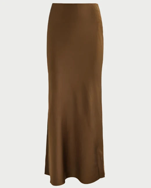 The Silk Column Maxi Skirt by Frame is a high-waisted, long brown satin skirt made from stretch silk, featuring a smooth, glossy finish and an elegant straight column silhouette.