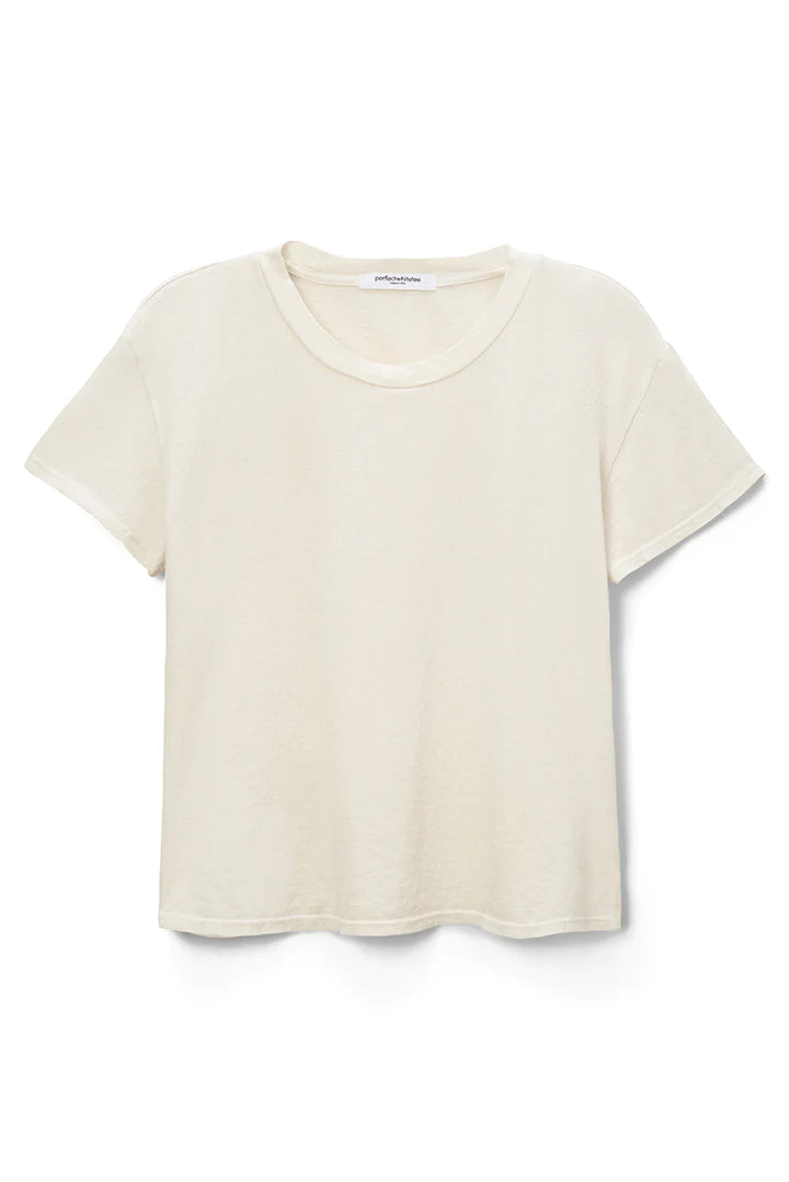 A plain white, short-sleeved T-shirt with a round neckline is displayed against a white background. The Harley Boxy Crew in Multiple Colors by perfectwhitetee has a relaxed fit and a slightly textured fabric, making it the perfect white tee for layering or wearing as one of your favorite cuts.