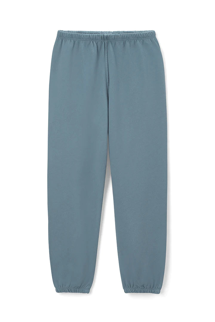 A pair of blue-grey Johnny Jogger sweatpants by perfectwhitetee made from buttery soft French terry cotton with an elastic waistband and elastic cuffs at the ankles. The fabric appears incredibly comfortable, ideal for casual wear or lounging. The sweatpants are displayed against a plain white background.