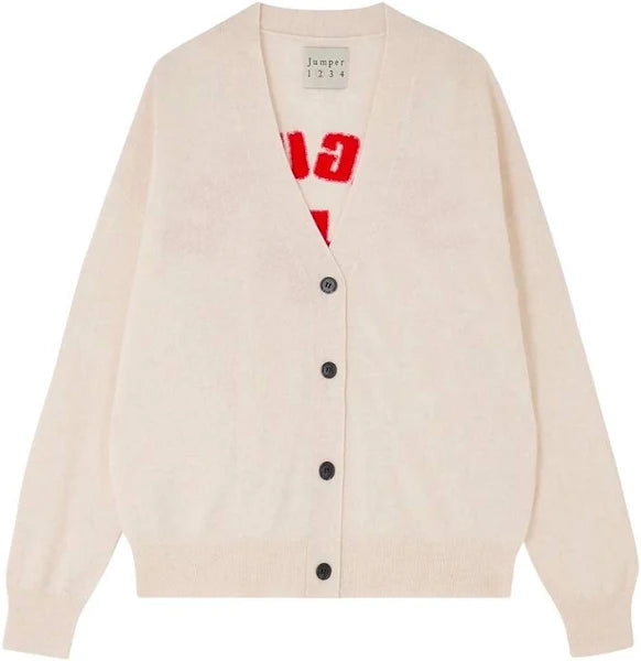 The Lifeguard Cardigan by JUMPER1234 features a deep V-neck, sleek black buttons, and an oatmeal hue. A red and white graphic pattern subtly peeks through underneath, while its cashmere elegance epitomizes luxury.